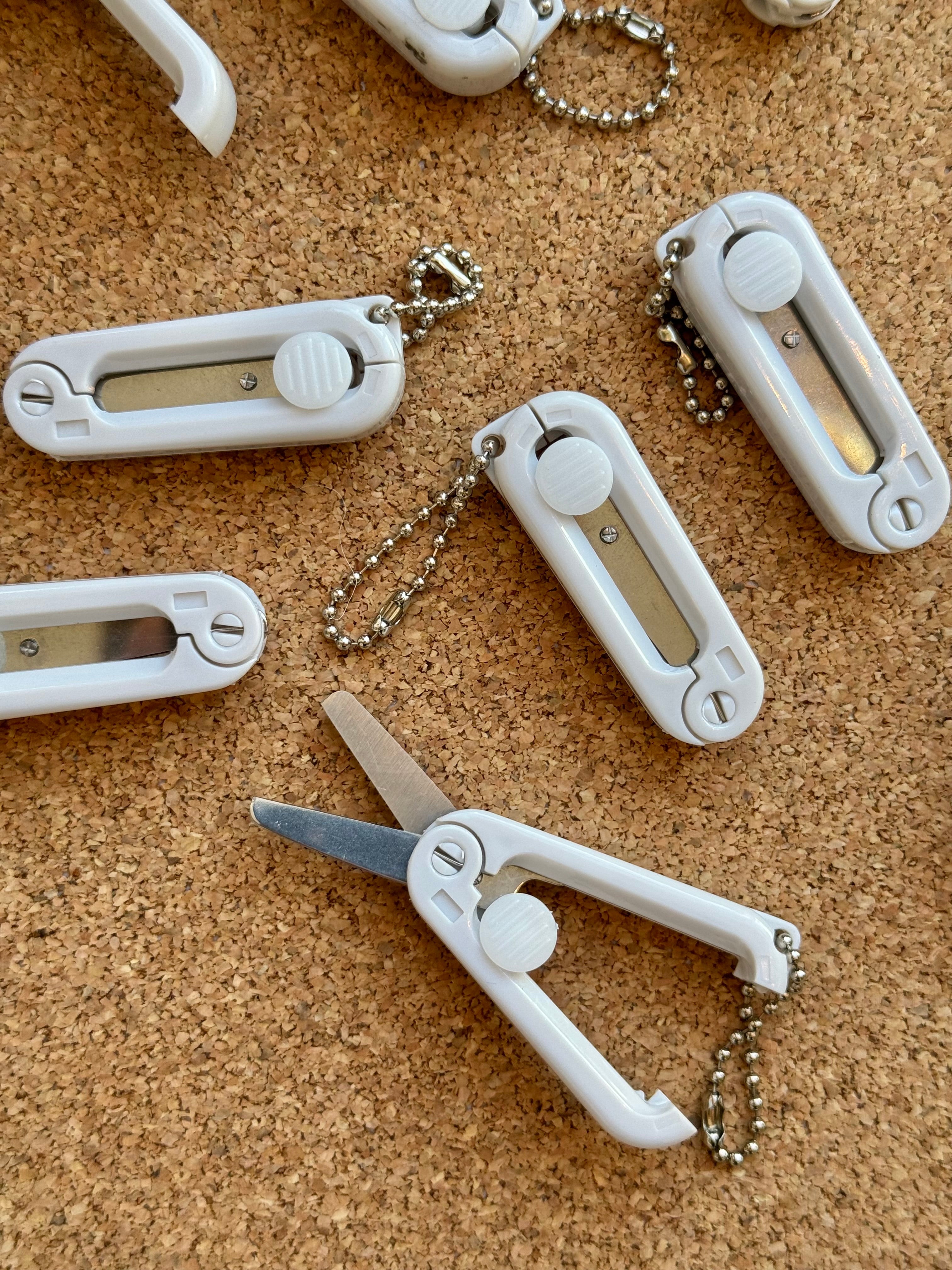 Small folding scissors keychain