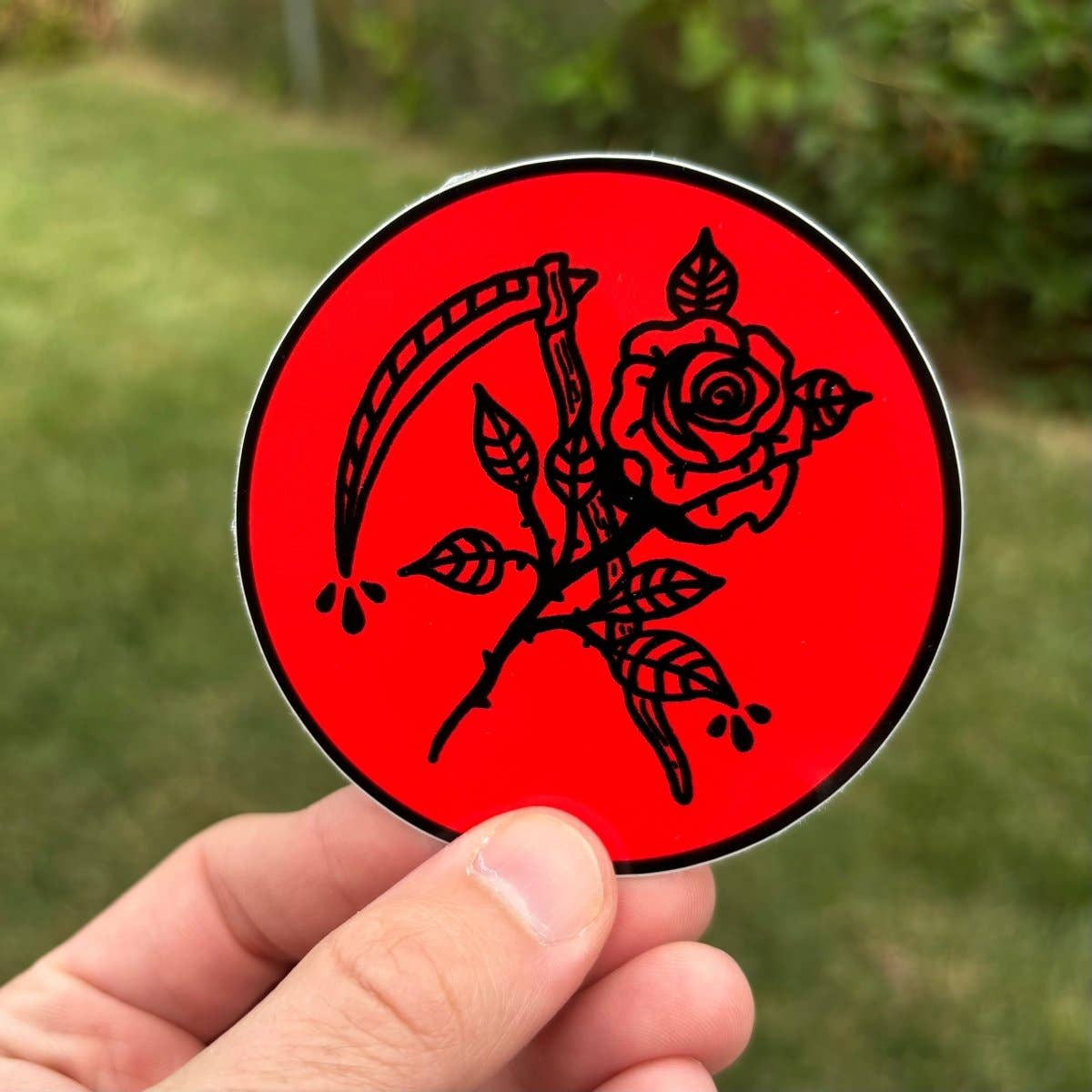 Scythe and rose sticker